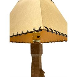 'Mouseman' tooled oak table lamp, the octagonal tapered stem carved with mouse signature, with shade, by Robert Thompson of Kilburn