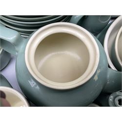 Denby Manor Green pattern part tea and dinner service, to include seven dinner plates, thirteen side plates, ten dessert plates, two oval dishes of various sizes, four cups and saucers, seven bowls with covers, two teapots etc (74)  