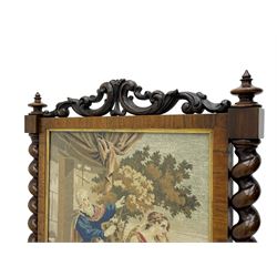 Victorian rosewood fire screen, scrolled foliage carved pediment, rectangular frame with moulded gilt slip enclosing figural needlework tapestry panel, on spiral turned supports with finials united by turned lower stretcher, on out-splayed feet with scroll carved terminals 