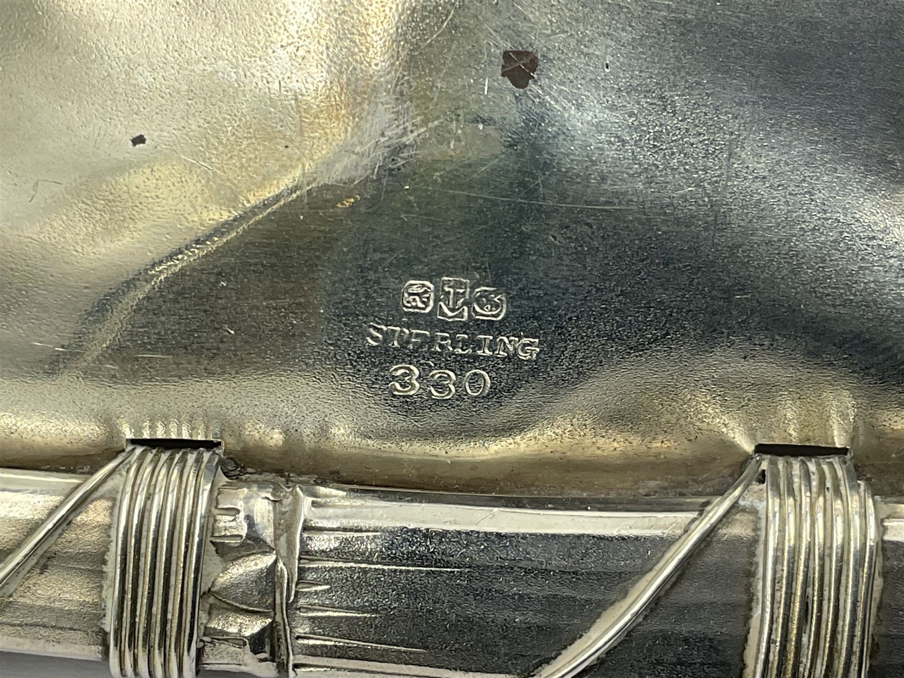 Mid/late 19th century Gorham silver serving spoon, circa 1863-1890, the bowl modelled as an oyster shell with silver gilt interior, affixed to the bamboo handle with silver twine, the bowl with marks for Gorham and impressed Sterling 330, L26.5cm
