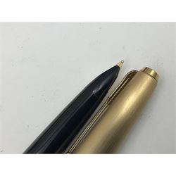 Three rolled gold Parker fountain pens, comprising an example with a gold nib marked 14K 585 and barrel with a shell stamp, a Parker 61 fountain pen with inset gold arrow to the nib, and another similar, all with striated decoration and arrow clips to the caps, L13cm, one with box