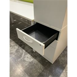 Modular two desk office system - comprising two desks, two returns, two filing drawer cabinets and one screen. Desk dimensions W160cm, D80cm, H73cm, pedestal dimensions W42cm, D80cm, H120cm - THIS LOT IS TO BE COLLECTED BY APPOINTMENT FROM DUGGLEBY STORAGE, GREAT HILL, EASTFIELD, SCARBOROUGH, YO11 3TX