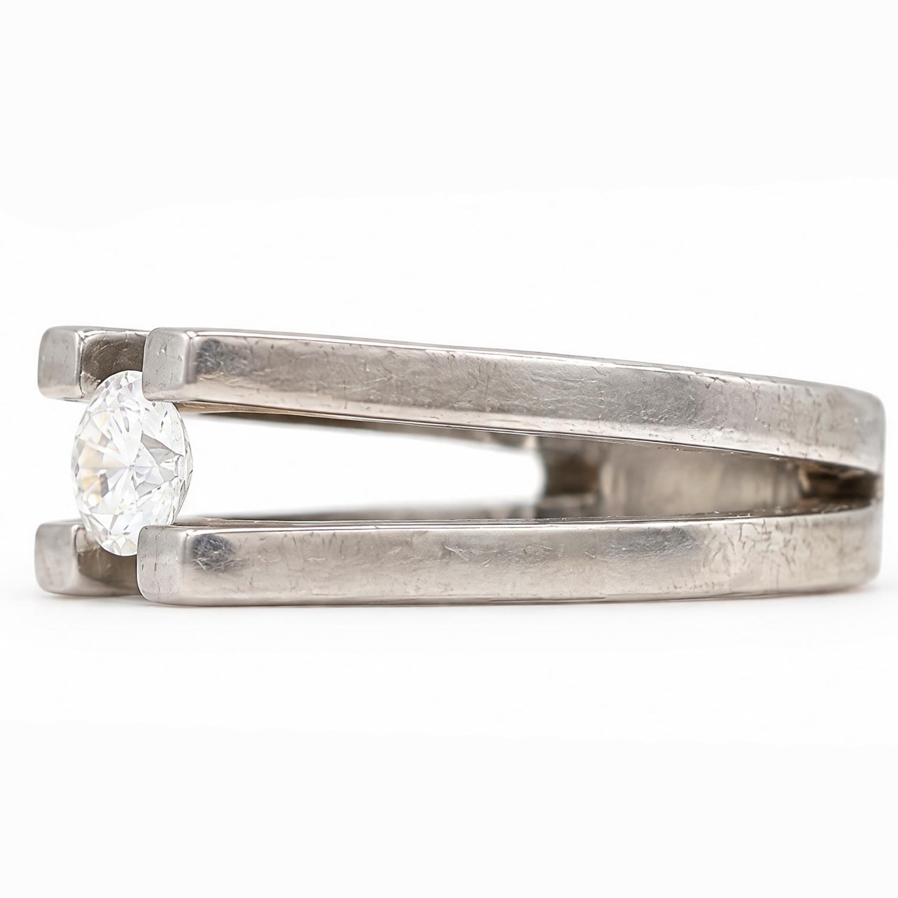 Titanium diamond ring, four claw set with a single round brilliant cut diamond of approx 0.45 carat