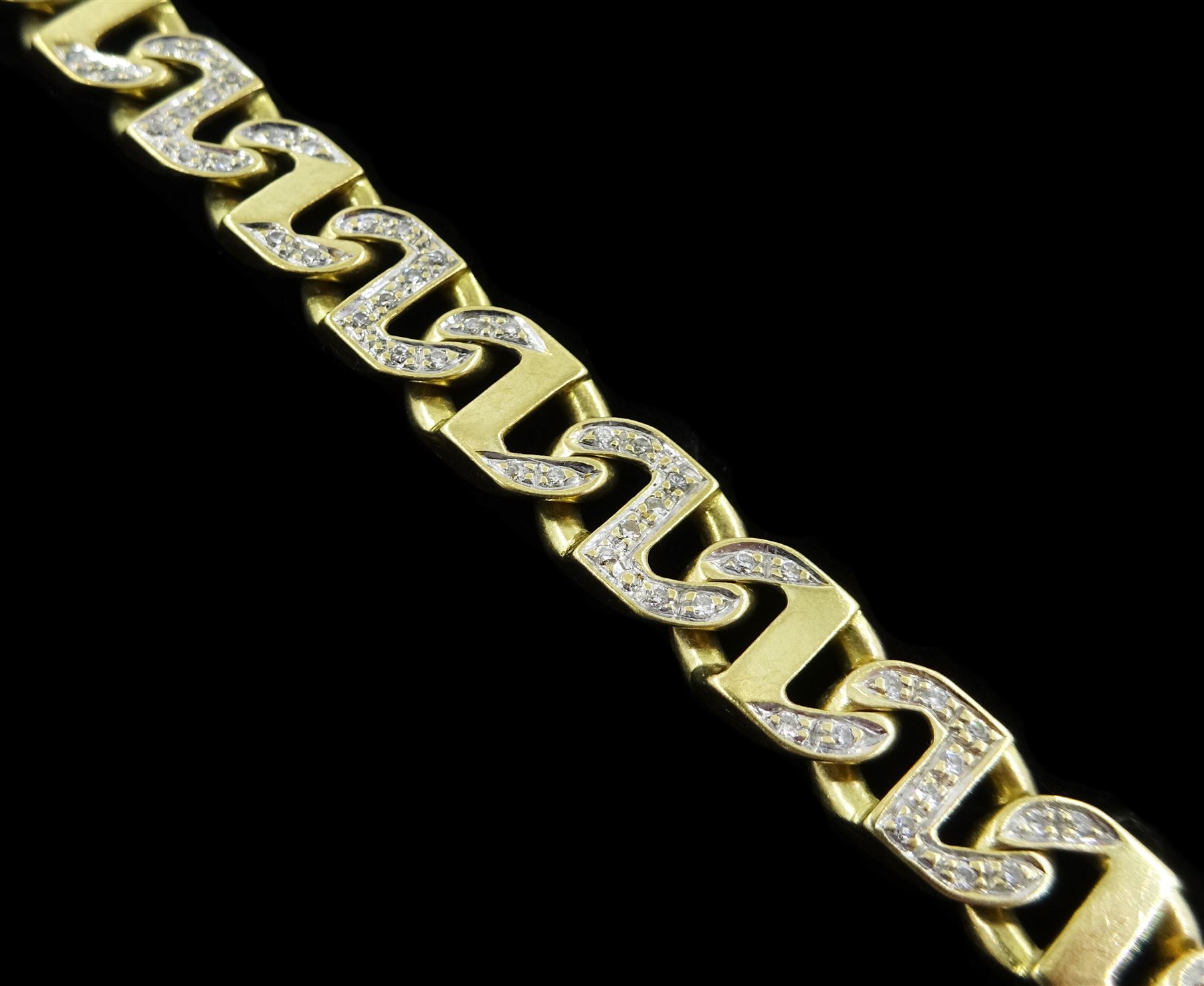 18ct gold diamond set marina link bracelet, stamped 750