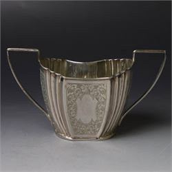 Late Victorian silver twin handled open sucrier and milk jug, of fluted form with panels of engraved foliate decoration, hallmarked D & M Davis, London 1896