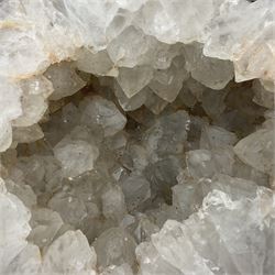 Amethyst crystal geode cluster, with well-defined crystals of various sizes, L22cm