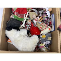 Large quantity of dolls to include oriental examples, native examples, knitted examples etc in four boxes