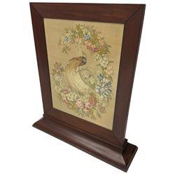 Victorian mahogany fire screen, the tapestry panel depicting peacock and flowers