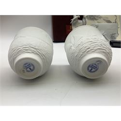 Lladro Collectors Society items, comprising of The Will to Create book, two candle holders; Sailing the Sea no 17665, Dolphins at Play no 17666, Plaque Bringing Us Together, key fob, leather wallet and a members joining pack with plaque, all in original boxes  