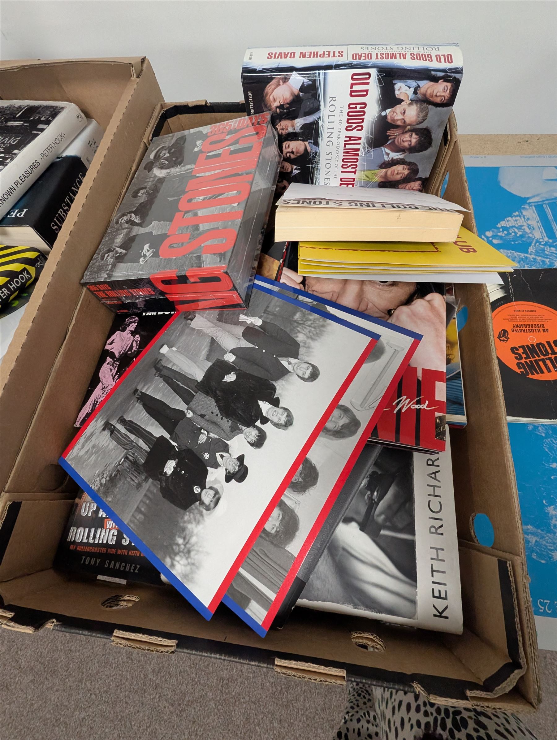 Collection of music memorabilia, including signed Peter Hook memorabilia, Status Quo, Rolling Stones, Neil Diamond, Joy Division tshirts, posters, books, etc