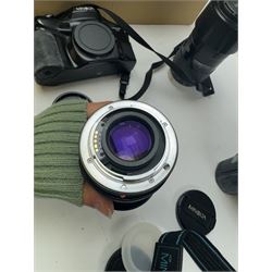 Six Minolta Dynax SLR camera bodies, comprising 800si serial no. 62703606, three 7xi examples, including one boxed example, serial nos. 20106944, 16123311 & 22107553, and two 9xi examples, serial no. 18209901 & 18202113, with three Minolta lenses, including Zoom xi 28-105mm 1:3.5(22)-4.5 lens, AF Zoom 28-85mm 1:3.5 (22)-4.5 lens and an AF Zoom 75-300mm 1:4.5(32)-5.6 lens, Hama carry case and other accessories