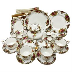 Royal Albert Country Roses pattern part tea and dinner service, to include teapot, four cups and saucers, four dessert plates, cake plate etc, (41)