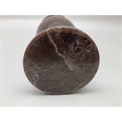 Red marble vase, of baluster form upon a stepped foot, H20cm 