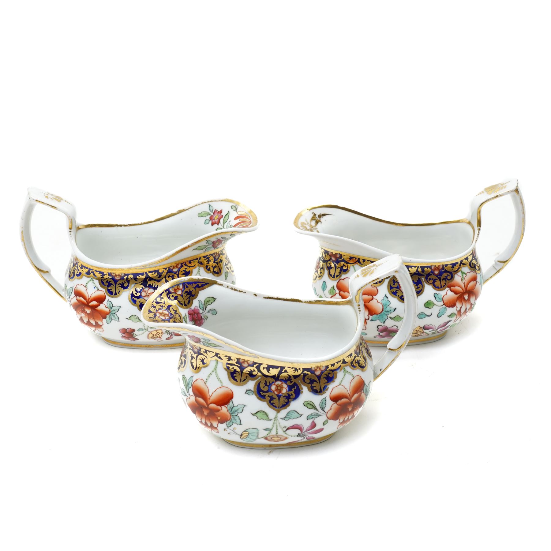 Number of early 19th century Chamberlain's Worcester pattern items decorated with Japanese flowers comprising pair of milk jugs, three sauce boats and two teapots, unmarked 
Provenance: property of a Nobleman