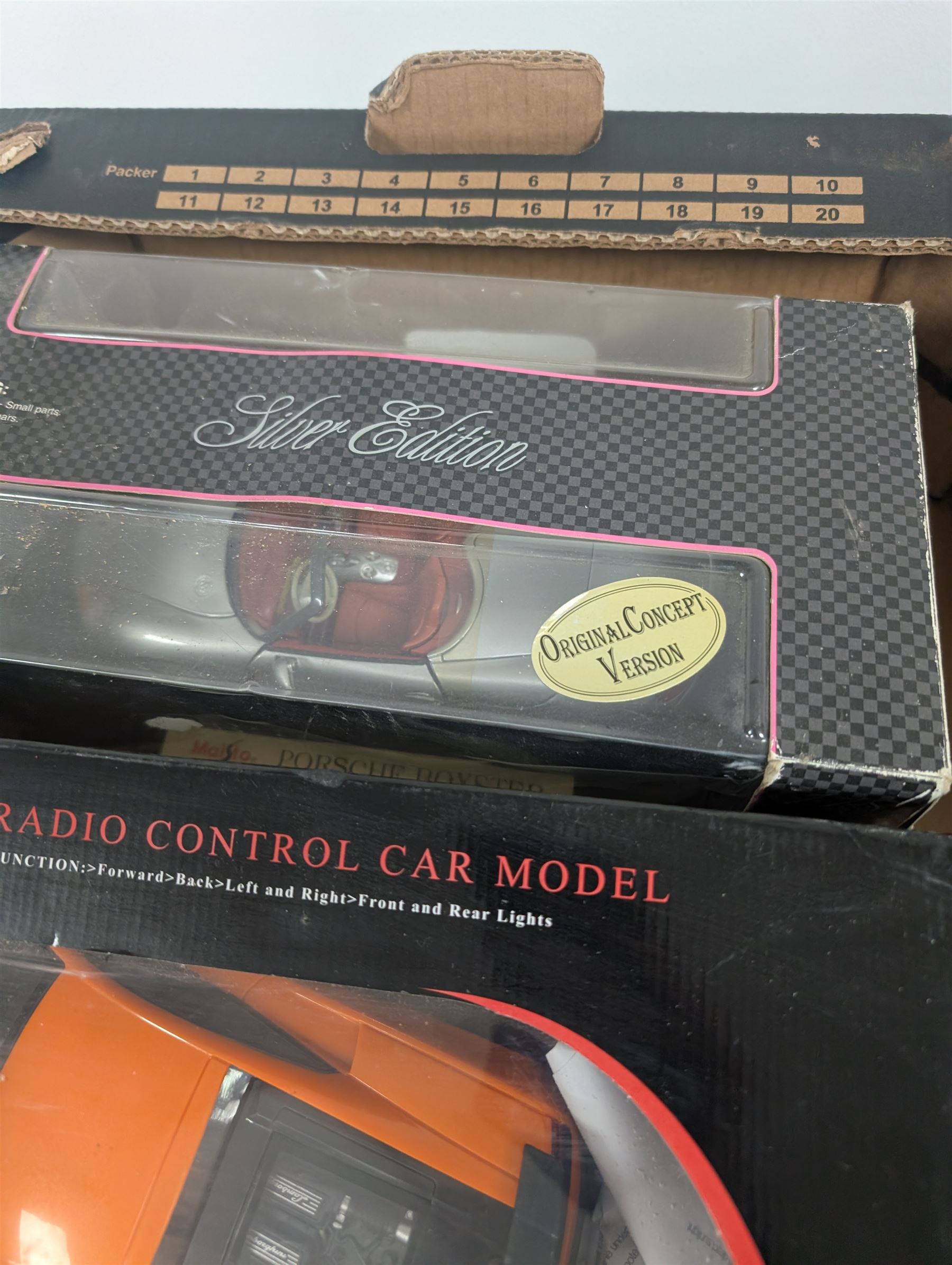 Fourteen 1:18 and 1:24 scale diecast model vehicles, including Classico Ferrari 1972 312, DX RC Lamborghini Gallardo, Maisto Silver Edition Porsche Boxter, , Bburago Williams Fw14, Bburago Ferrari 641/2, etc all boxed