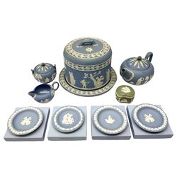 Late 19th century pale blue Wedgwood Jasperware cheese dome with cover, decorated with acorn and oak leaf bands surrounding neo-classical ladies, cherubs, flowers and trees, impressed Wedgwood mark beneath, together with further Wedgwood Jasperware teapots, boxed dishes etc