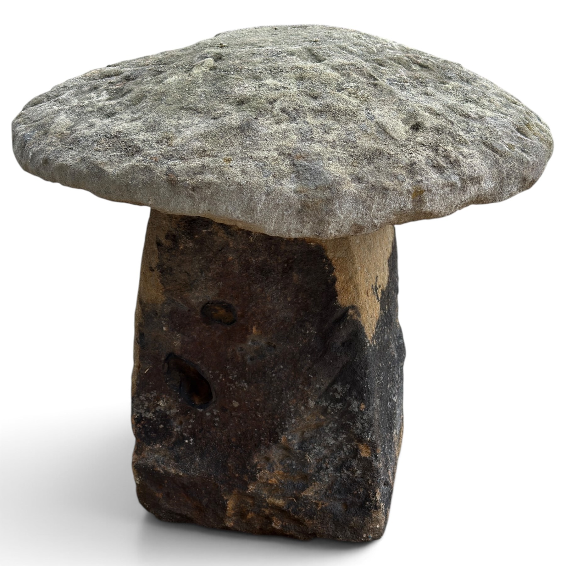 Pair of 19th century weathered hewn sandstone two-piece staddle stones, domed circular top over a tapering base