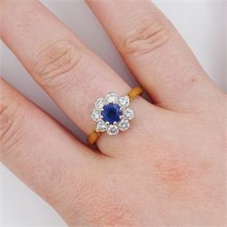 18ct gold round cut sapphire and round brilliant cut diamond cluster ring, hallmarked, sapphire approx 0.50 carat, total diamond weight approx 0.50 carat