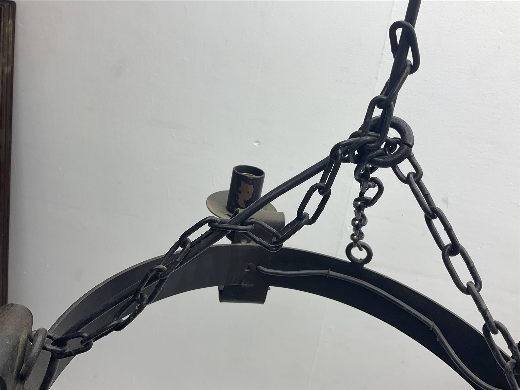 Pair of gothic style wrought iron ceiling lights, each with four branches, D58cm