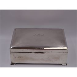 1920s silver mounted presentation cigarette box, of rectangular form, with engraved initials J.W.J and dated 1902-1927 to slightly domed hinged cover, opening to reveal compartmentalised softwood interior, upon four bracket feet, hallmarked Birmingham 1920, maker's mark worn and indistinct, H9cm, W23cm, reputedly given to John William Johnson, father of Amy Johnson,  famous for being the first long distance (to Australia) solo female pilot, and first female British grounds engineer, for his silver wedding anniversary