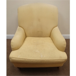  Laura Ashley Howard style armchair, upholstered in a gold patterned fabric, turned supports, brass castors, W90cm  