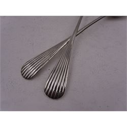 Pair of early 20th century silver salad servers, both with shaped bowls and fluted handles, hallmarked James Dixon & Sons Ltd, Sheffield 1918