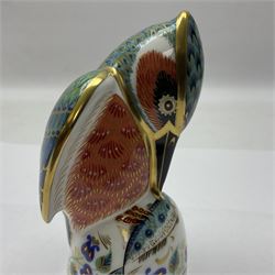 Two Royal Crown Derby paperweights, comprising Kingfisher, 2010 edition with gold stopper and Robin, with gold stopper