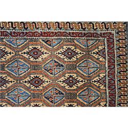 North East Persian Moud hand-knotted carpet, ivory field with an-over Herati inspired lattice of repeating lozenge and diamond motifs, with stylized floral devices and angular vinery in tones of sky blue, indigo, madder red and camel, principal border with a sequence of stylized palmettes and angular vine motifs, framed by narrow guard stripes, with cotton fringe ends