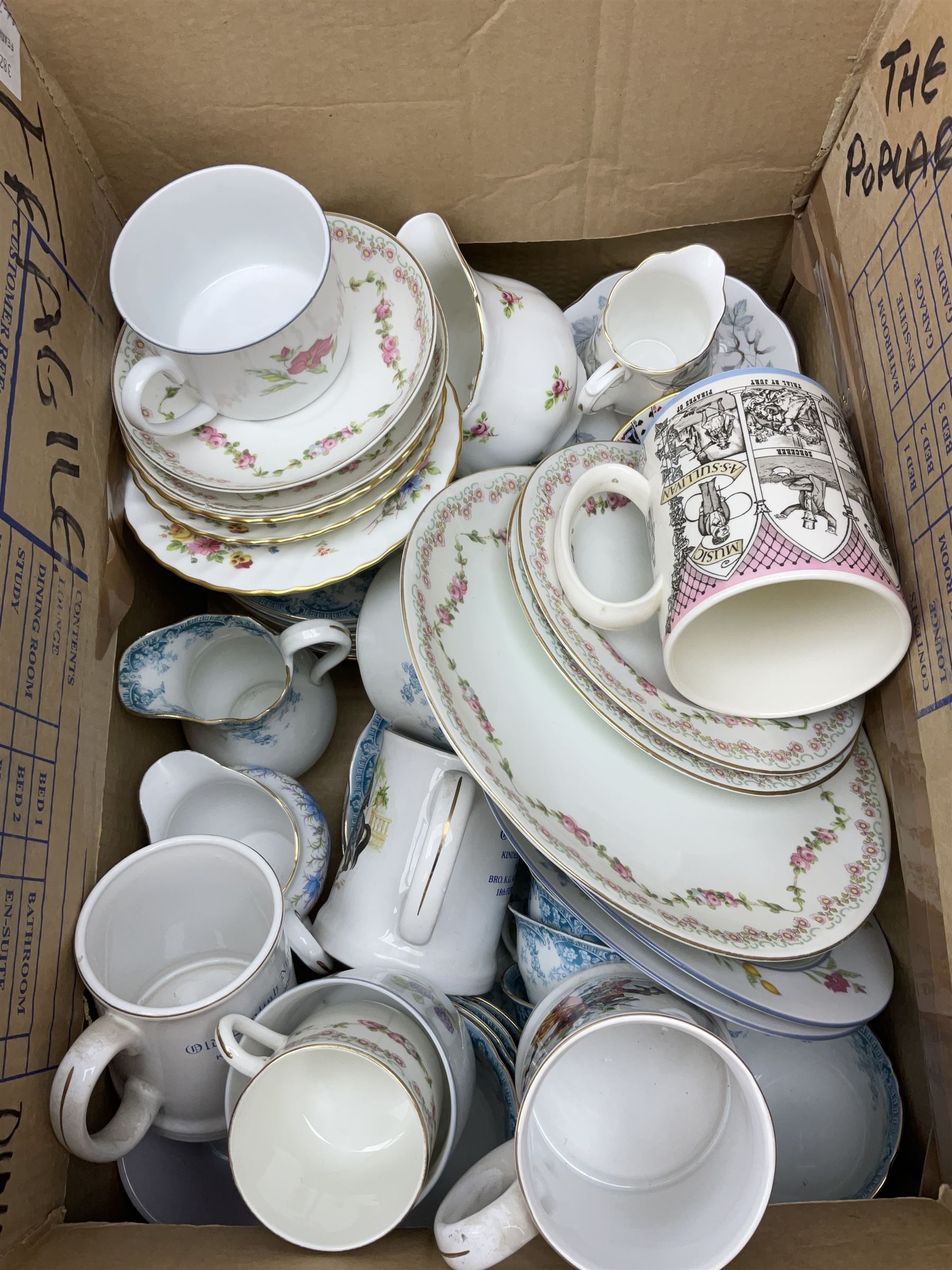 Collection of tea and dinner wares, including an extensive set of 'Christmas Rose' Crown Staffordshire, including tea and coffee wares and two lidded tureens, a blue and white decorated set of cups and saucers, cake stand etc, three boxes . 