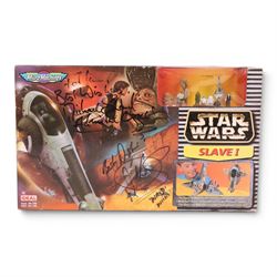 Galoob Micro Machines Star Wars Slave I, signed by Warwick Davis and Michael Sheard in bla...