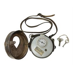 Metal cased drum shaped travelling clock
