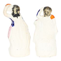 Six 19th century Staffordshire Theatre figures, comprising rare example of Jules Perrot as Diavolino, Jules Perrot as Albrecht, Carlotta Grisi as Esmeralda, Carlotta Grisi as Esmeralda and Jules Perrot as Gringoire, and further pair, tallest example H24.5cm


