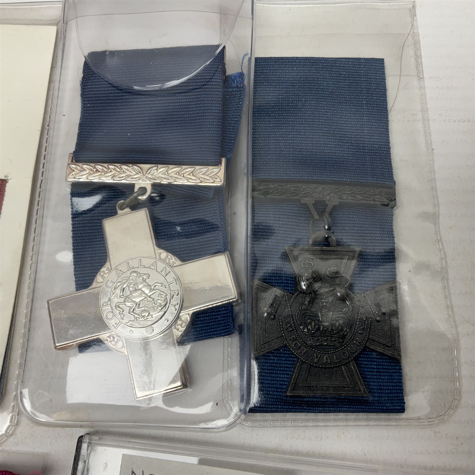 Two Imperial Service Medals to Elsie Hannah Ferguson and Fred Whitehead; each in original case; WWI Special Constabulary Medal to Inspr. Alfred W. Thompson; modern Prisoner of War Medal; cased; replica Victoria Cross and India Mutiny Medals with archive of information relating to Pte. Robert Newell V.C. 9th Lancers; replica Victoria Cross and George Cross with miniatures; and other replica medals etc