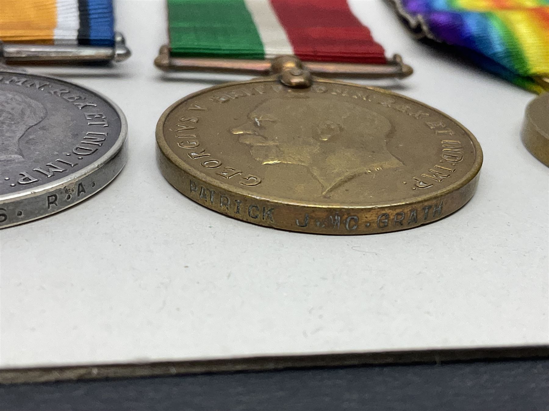 Representative display of five WWI Campaign Stars and Medals to different recipients comprising 1914 'Mons' Star to 13800 Gnr. R. Pexman R.F.A.; 1914-15 Star to TS822 F. Bage T.R. R.N.R.; British War Medal to 90461 Dvr. A.A. Cross R.A.; Mercantile Marine Medal to Patrick J. Magrath; and Victory Medal to 2657 Cpl. W.R. Kenny Norf. Yeo.; all with ribbons (5)