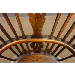  19th century elm and yew wood double bow Windsor armchair, crinoline stretcher  