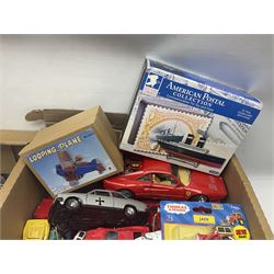 Quantity of play worn die-cast model cars, to include examples by Matchbox, Bburago, Solido etc, housed in various cases, two Bburago models of Ferraris, together with other die cast vehicles etc, in two boxes