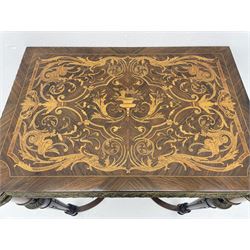 Late Victorian inlaid rosewood card table, the top inlaid with central urn surrounded by scrolled interlacing foliage and zoomorphic bird motifs, single satinwood band and boxwood stringing, the top swivelling to reveal fitted storage well and folding with baize lined interior, the friezes inlaid with scrolled leafage, serpents and masks, each corner inlaid with shell motif, on turned and fluted ebonised supports connected by shaped x stretcher mounted by gilt metal urn, gilt metal mounts and fittings, turned feet