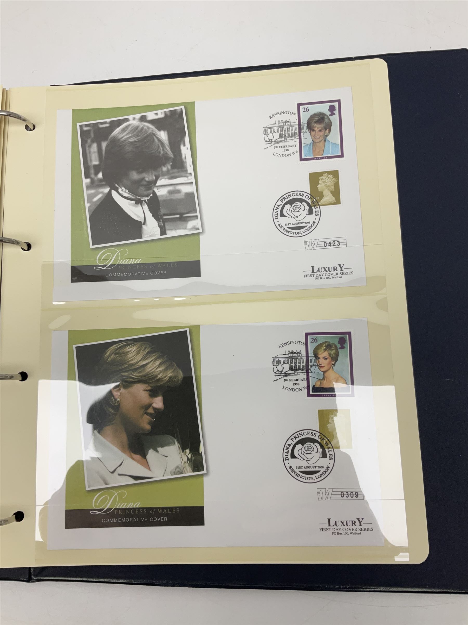 Stamp and coin covers, including 2006 'Her Majesty Queen Elizabeth II 80th Birthday' containing five pounds coin, first day covers relating to Diana Princess of Wales etc, housed in a ring binder folder