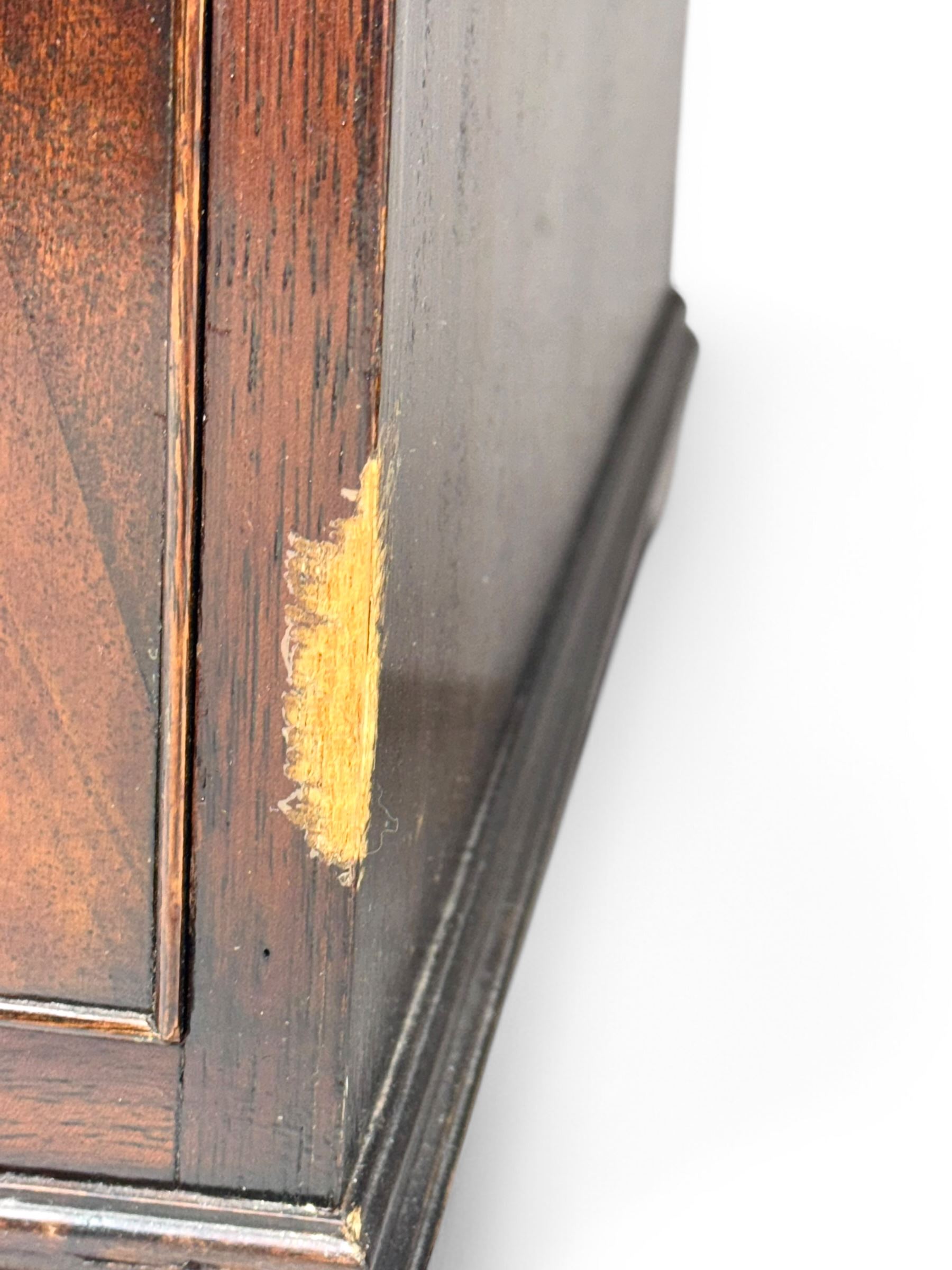 Georgian design mahogany kneehole desk, moulded rectangular top with red gilt-tooled leather writing surface, over an arrangement of nine cock-beaded drawers with brass swan neck handles, on bracket feet