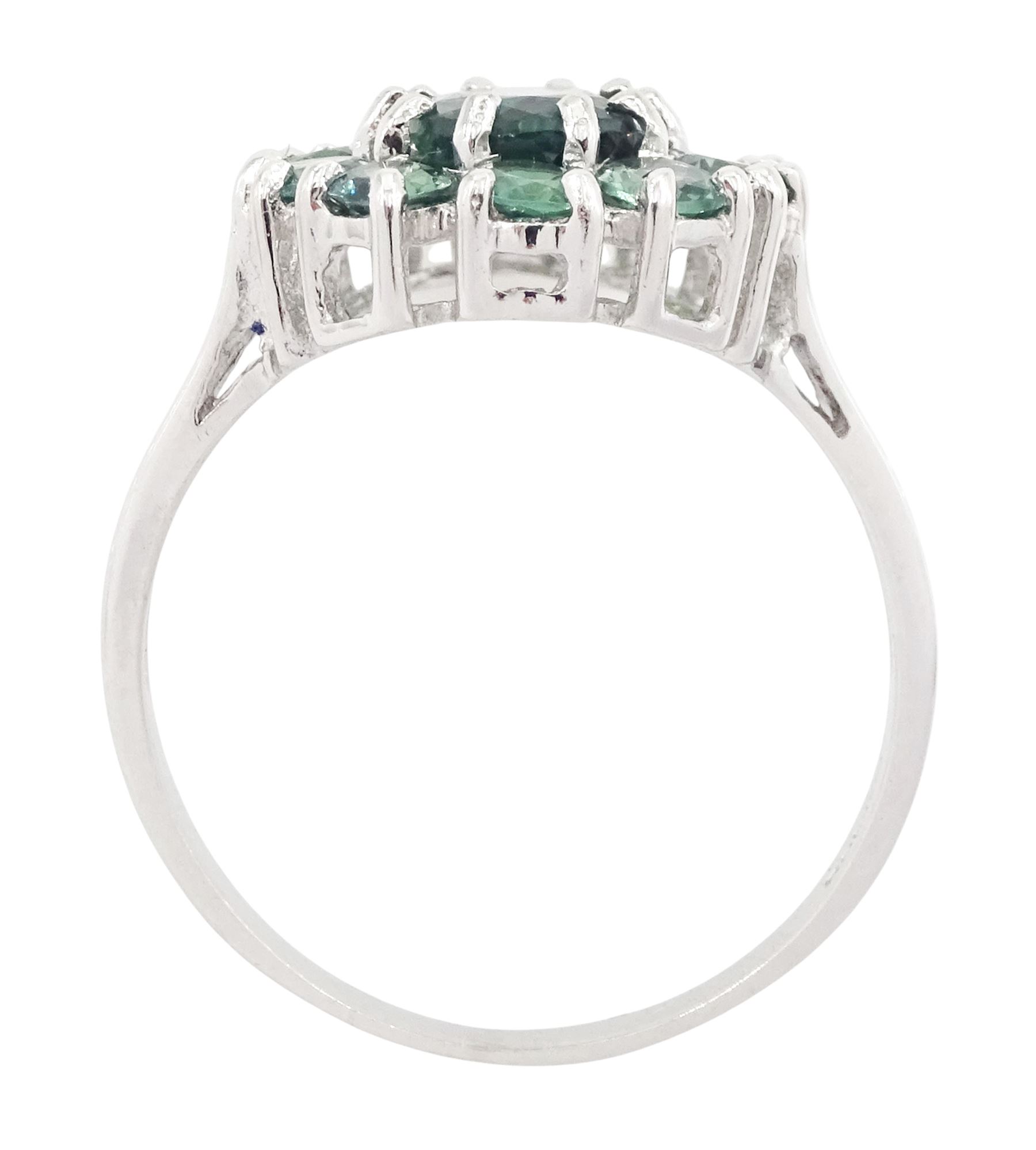 18ct white gold green sapphire cluster ring, oval cut sapphire of approx 1.40 carat, surrounded by ten round cut sapphires, Birmingham 2005, total sapphire weight approx 2.40 carat
