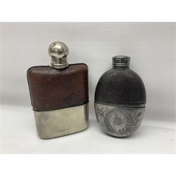 Silver plated glass and pressed leather hip flask, with swivel cap and removable cup, together with a similar oval example, engraved with wreath and initial B, tallest H16.5cm