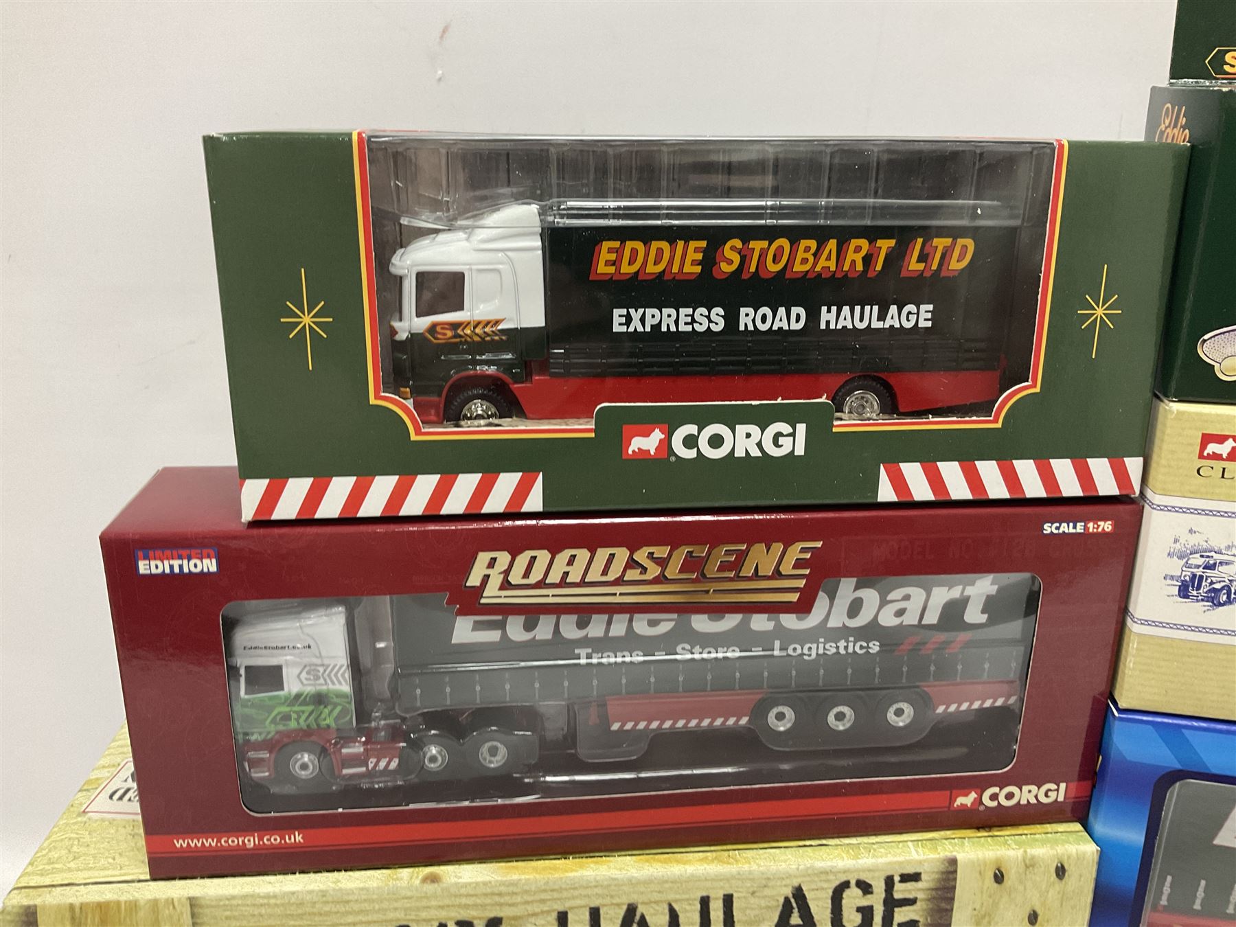 Corgi Eddie Stobart - eighteen promotional and advertising models including heavy haulage vehicles, coach, figures etc; and five others by Saico, Lledo and Atlas Editions; all boxed (23)
