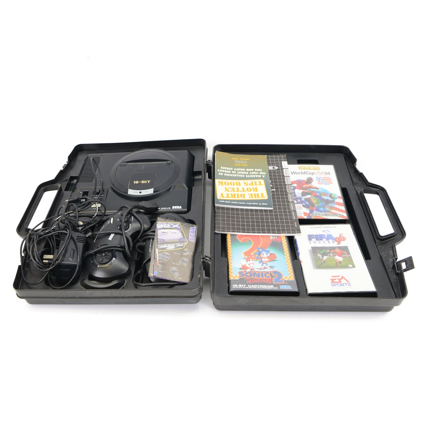 16-Bit Sega Mega Drive console with two controllers and four games, comprising Fifa 96, Sonic The Hedgehog 2, Sonic The Hedgehog Pinball and World Cup USA 94, contained within fitted plastic carrycase with instruction manual and cheats book
