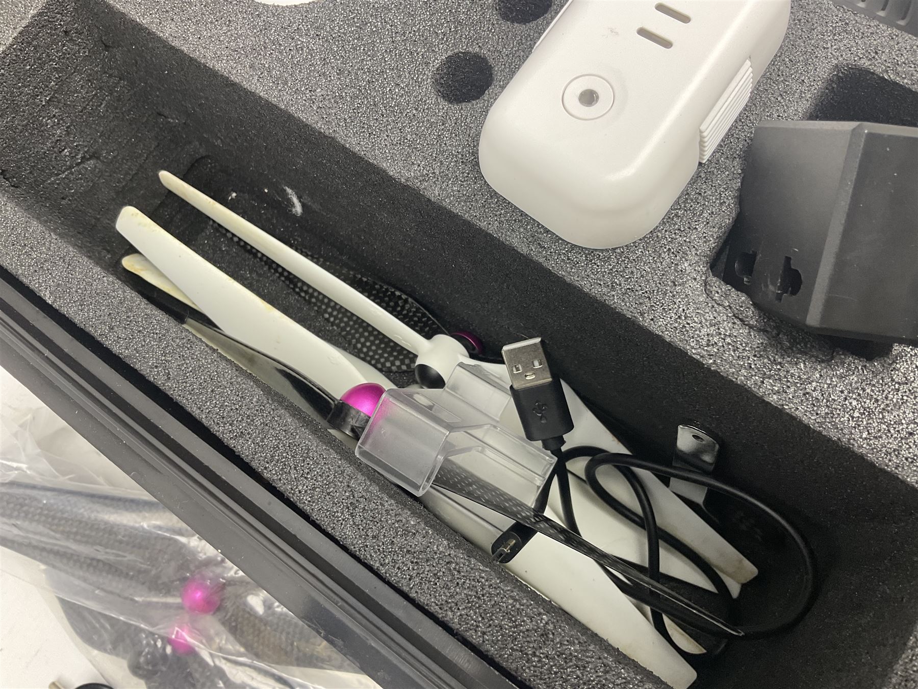 DJI Phantom 2 Vision Plus 3.0 drone, with controller, battery pack, blades, chargers and other accessories in fitted foam lined hard plastic case