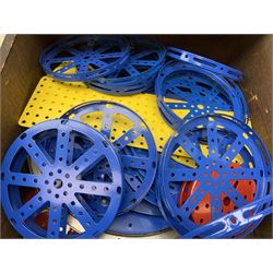 Meccano - large quantity of sections, various colours and ages, including long length angled strips and girders, hub discs, circular girders, various flat and flanged plates, wheels, nuts and bolts, digger buckets, funnels, chains, threaded rods and axle rods etc