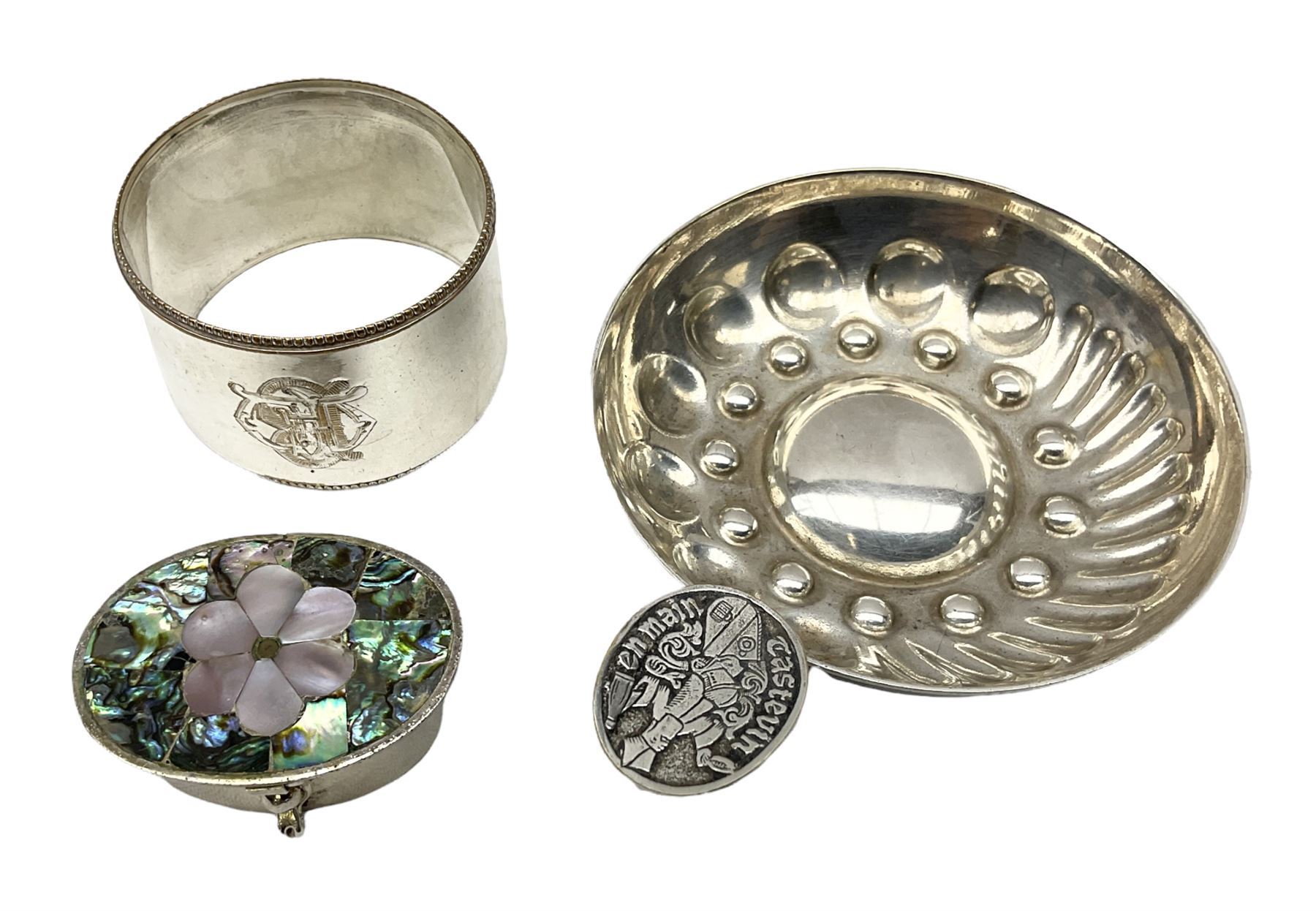 French silver plated wine taster of typical form, stamped, together with a silver plated napkin ring, and an 'Alpaca Silver' pill box with mother of pearl detailed cover, (3) together with Two pairs of late 19th/early 20th century Chinese Lotus shoes for binding feet, the first with purple silk heavily embroidered with ornate floral motifs, L10cm the second larger fuschia and black pair with thicker sole embroidered with flowers, L14cm