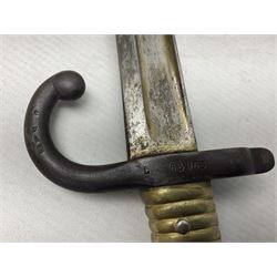 French Model 1866 Chassepot bayonet with 57cm curving fullered steel blade dated 1873 No.L63963; in steel scabbard with conforming number L71.5cm overall; and French St. Etienne Gras bayonet dated 1878 No.K10674 in steel scabbard numbered 79437 (2)