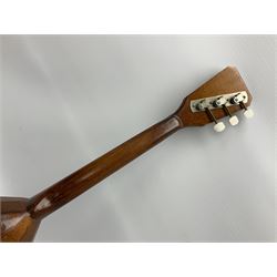 Russian balalaika with six-piece segmented back, the top painted with a scene of Russian onion capped buildings monogrammed K.B.H.1993; bears cyrillic label; L67.5cm; in carrying bag