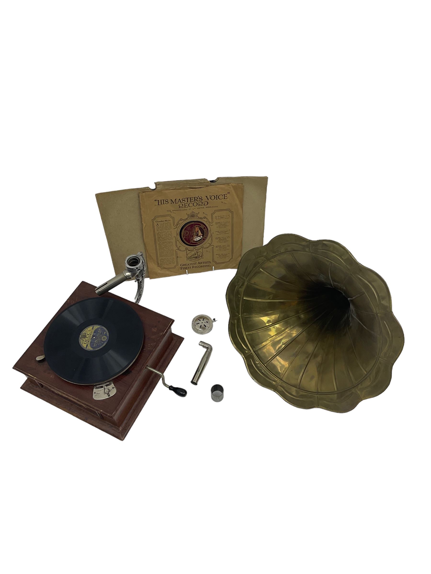 The Winchester mid 20th century gramophone with horn, and three records