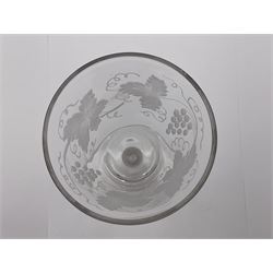 Set of three 18th century style wine glasses, each with funnel bowl etched with fruit vine, upon a double series air twist stem and circular foot, H17cm